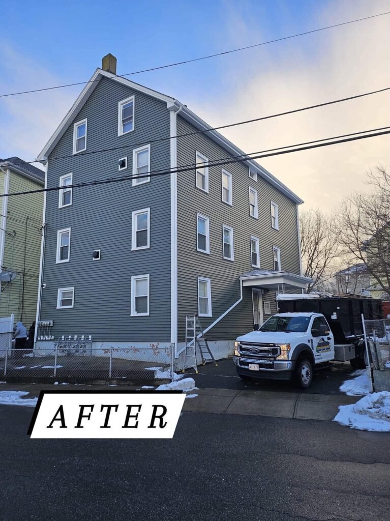 Completed vinyl siding project with Daniela's Construction truck in Massachusetts